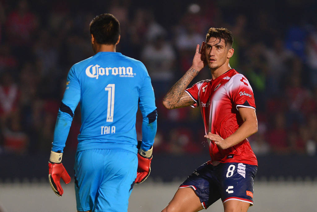 Gabriel Peñalba (d) anotó de penal el gol del empate. (Jam Media)