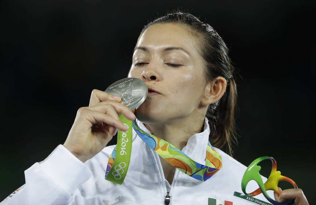 La taekwondoísta mexicana María del Rosario Espinoza se va de Río de Janeiro con el sabor dulce de una medalla de plata y convertida en la mejor deportista femenina de la historia de su país. (Archivo)   