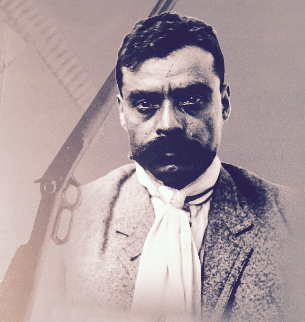 Emiliano Zapata, el Caudillo del Sur, con su bandera de Tierra y Libertad.