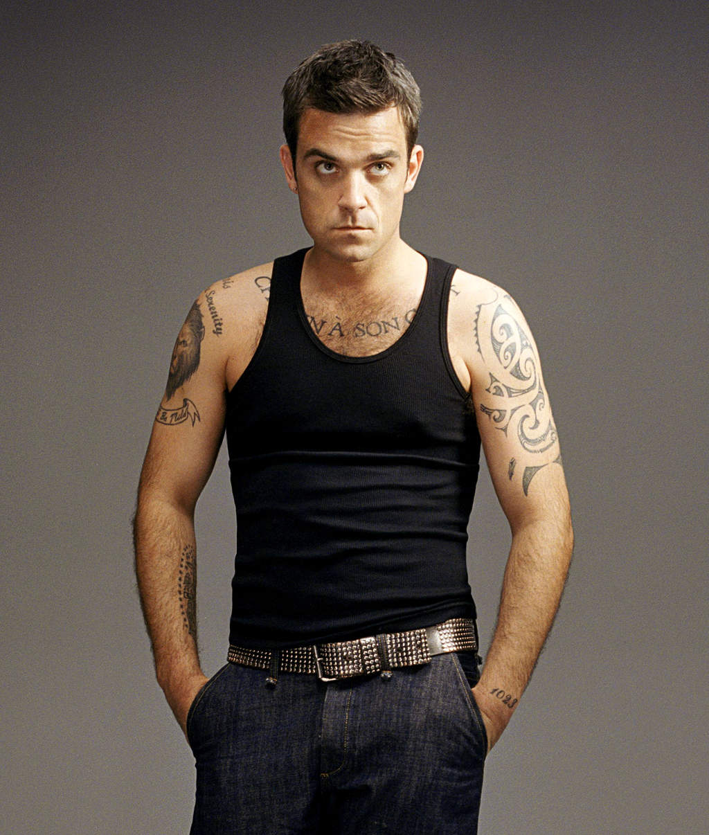 Robbie Williams aún va a terapia por sus adicciones