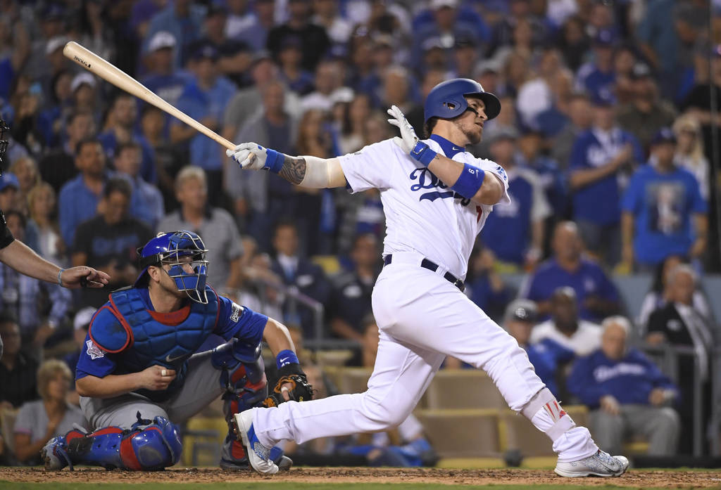 Yasmani Grandal conectó en el momento clave para aportar a la ofensiva de los Dodgers.  (Fotografía de AP)