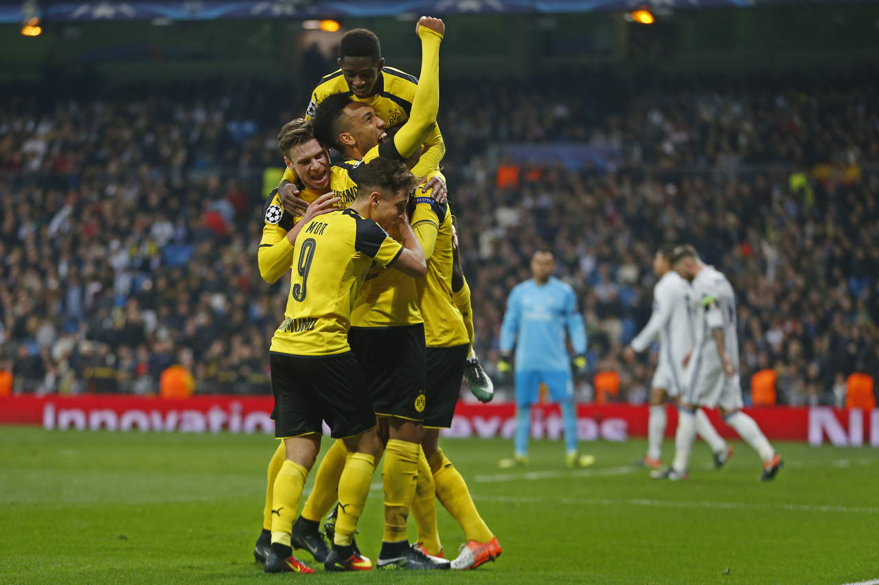 Jugadores del Borussia Dortmund celebran el gol del empate ante Real Madrid. (AP)