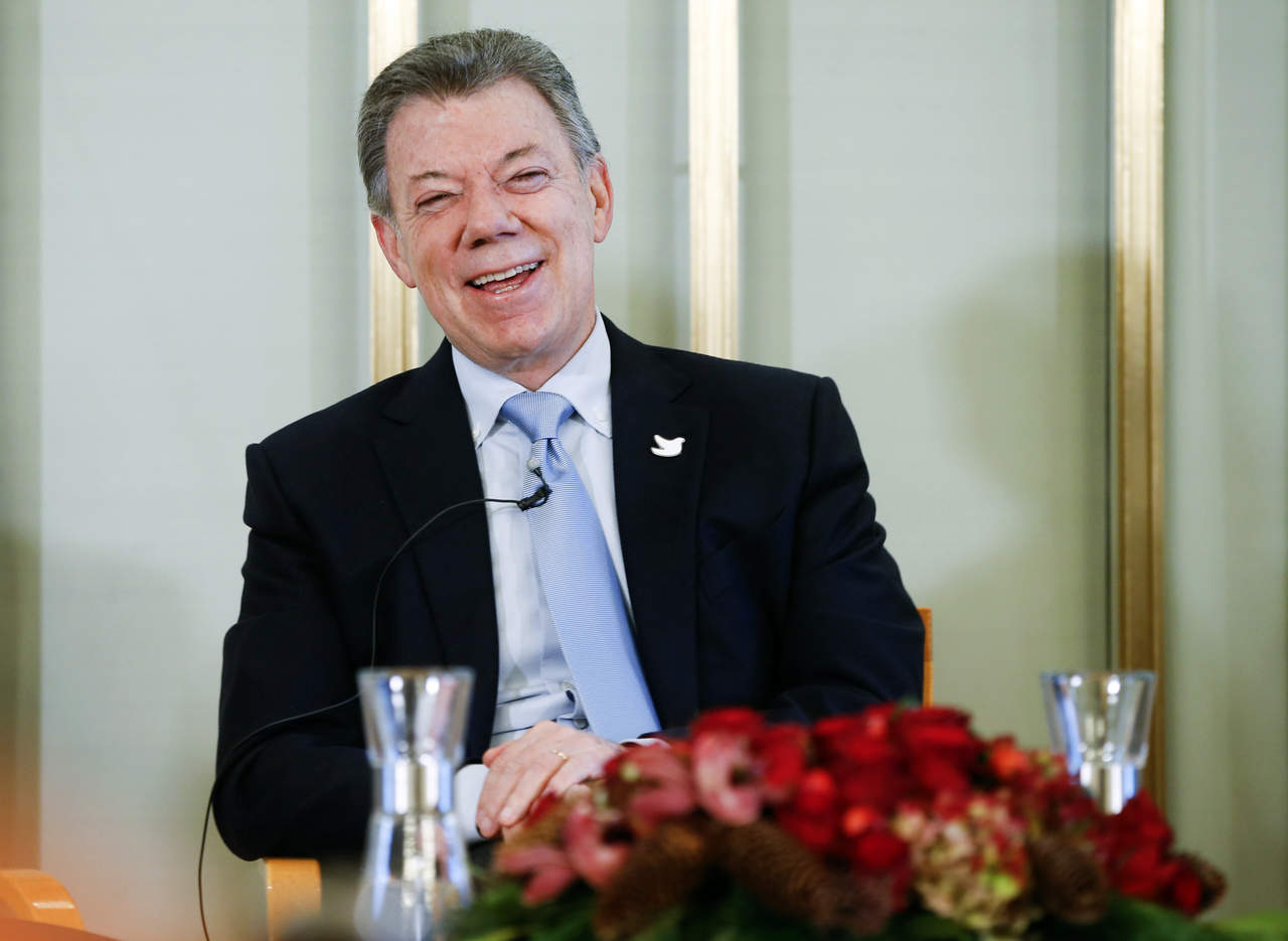 Santos recibirá este sábado en Oslo el Nobel de la Paz por su contribución a la terminación del conflicto armado en el país gracias al acuerdo de paz firmado con las Fuerzas Armadas Revolucionarias de Colombia. (AP)