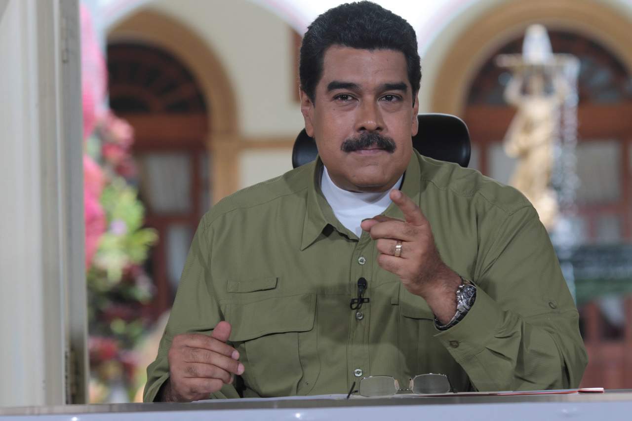El gobierno del presidente Nicolás Maduro afirmó en una declaración que el anuncio de conversaciones para un posible acuerdo quebranta la palabra empeñada por Santos en 2010 de no concretar una alianza militar con la OT (ARCHIVO)