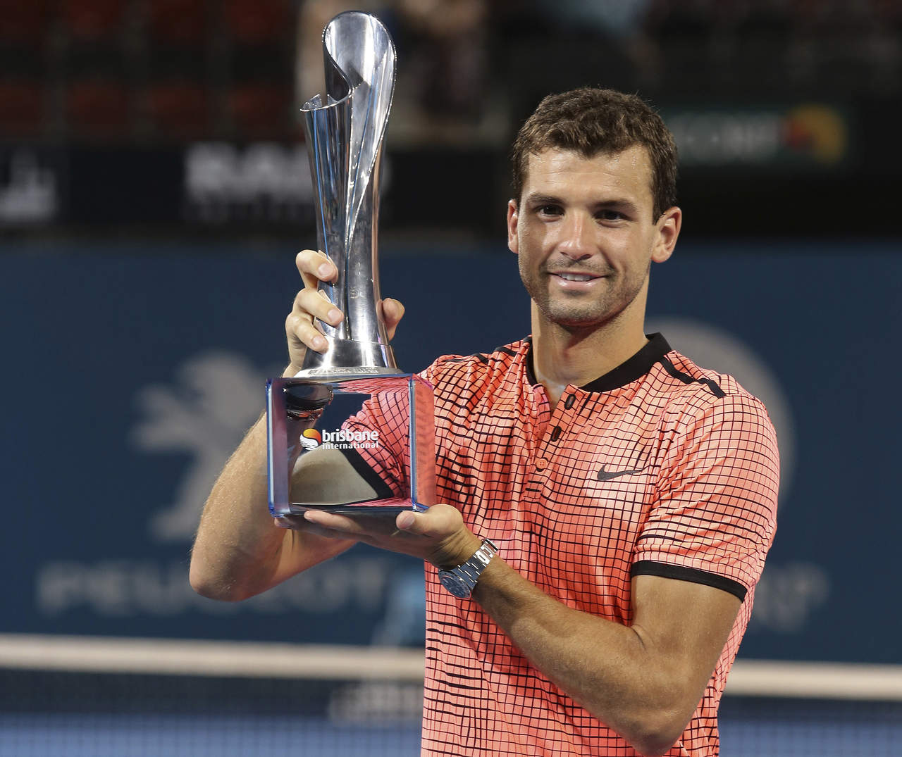 Grigor Dimitrov venció en la final al japonés Kei Nishikori por 6-2, 2-6 y 6-3. (AP)