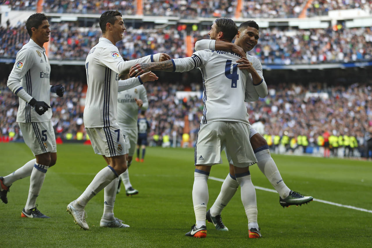 Otra vez con su capitán Sergio Ramos como la figura, Real Madrid venció 2-1 al Málaga.  (Fotografía de AP)