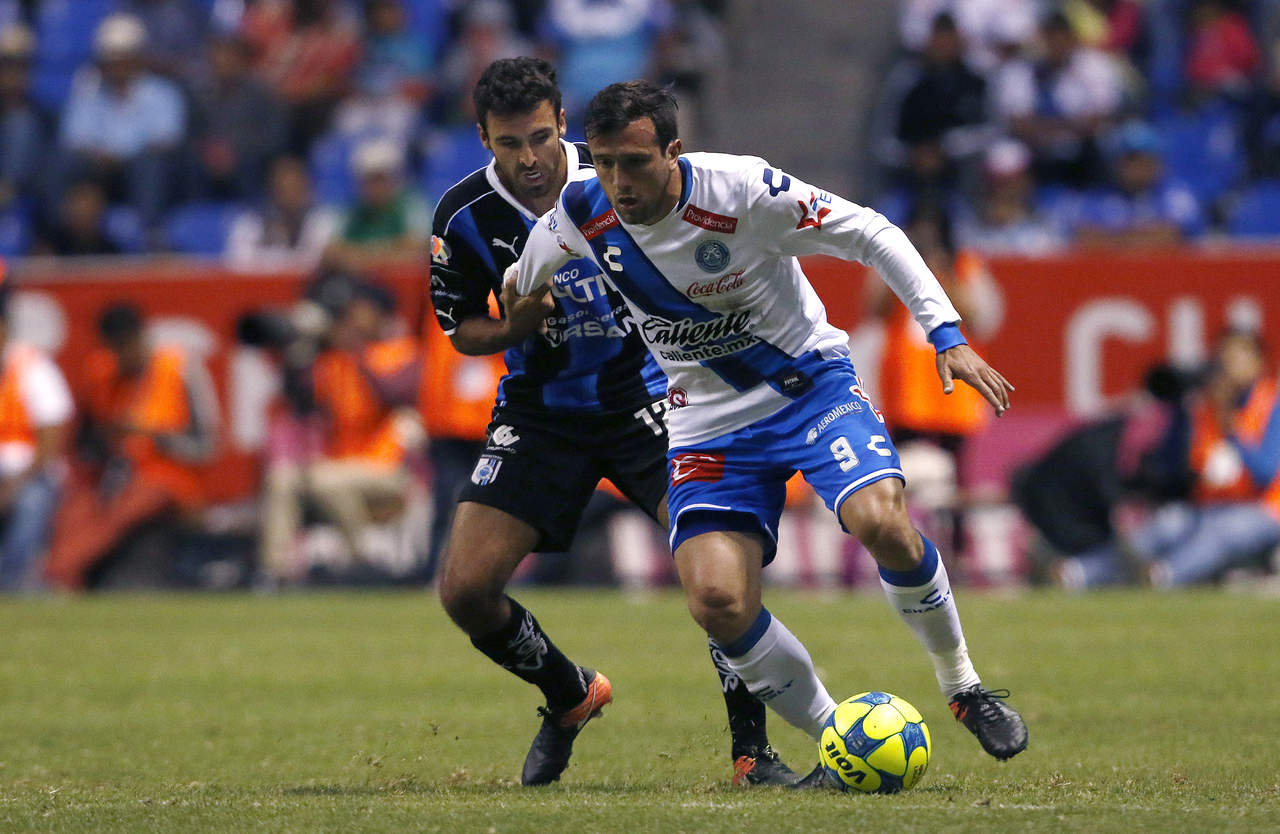 Puebla logró su primer punto del torneo y salió del fondo de la tabla general. (Jam Media)