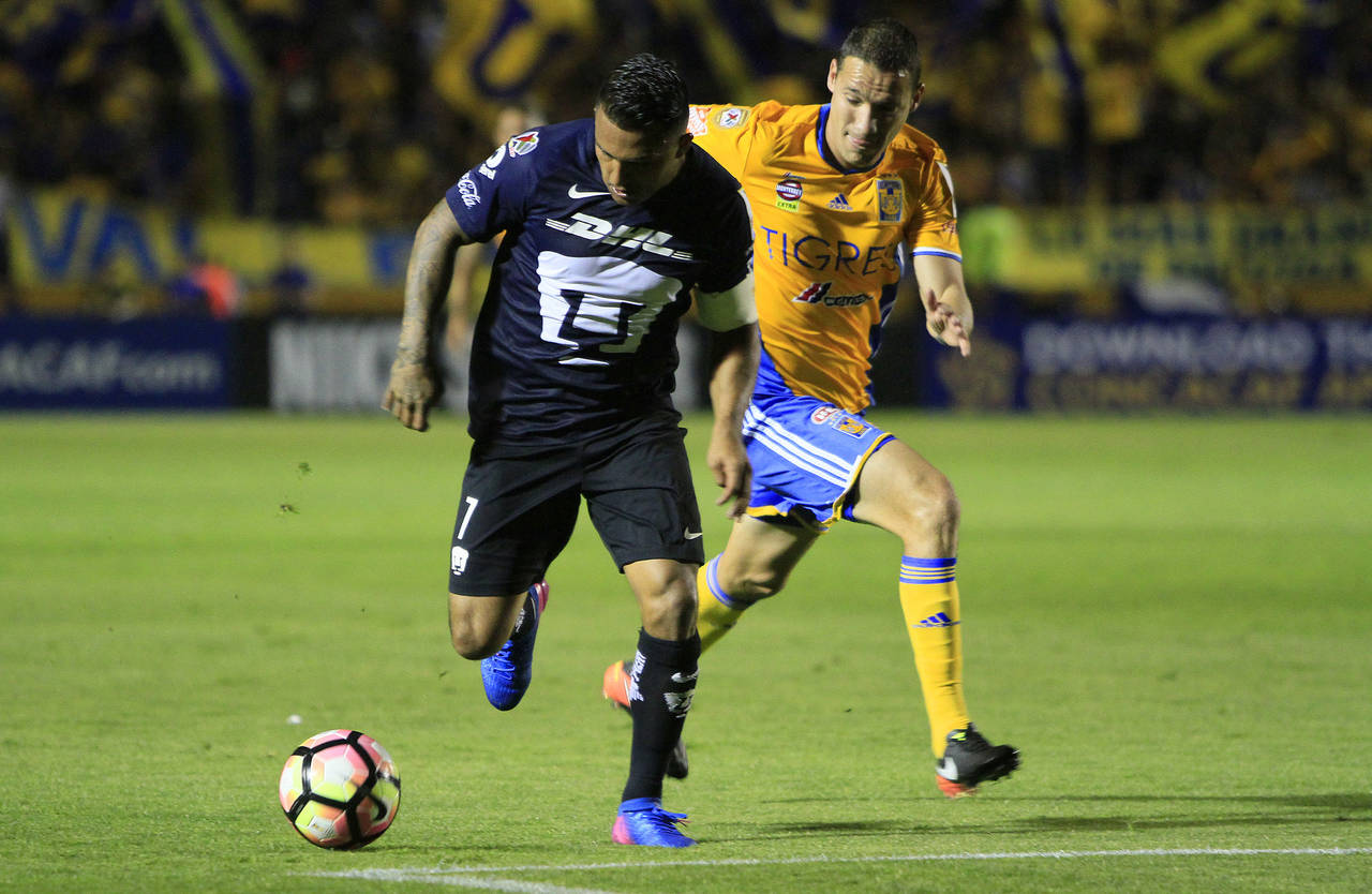 En duelo de felinos, Tigres y Pumas igualaron a un gol en la ida de los cuartos de final de la Concachampions. (Jam Media)