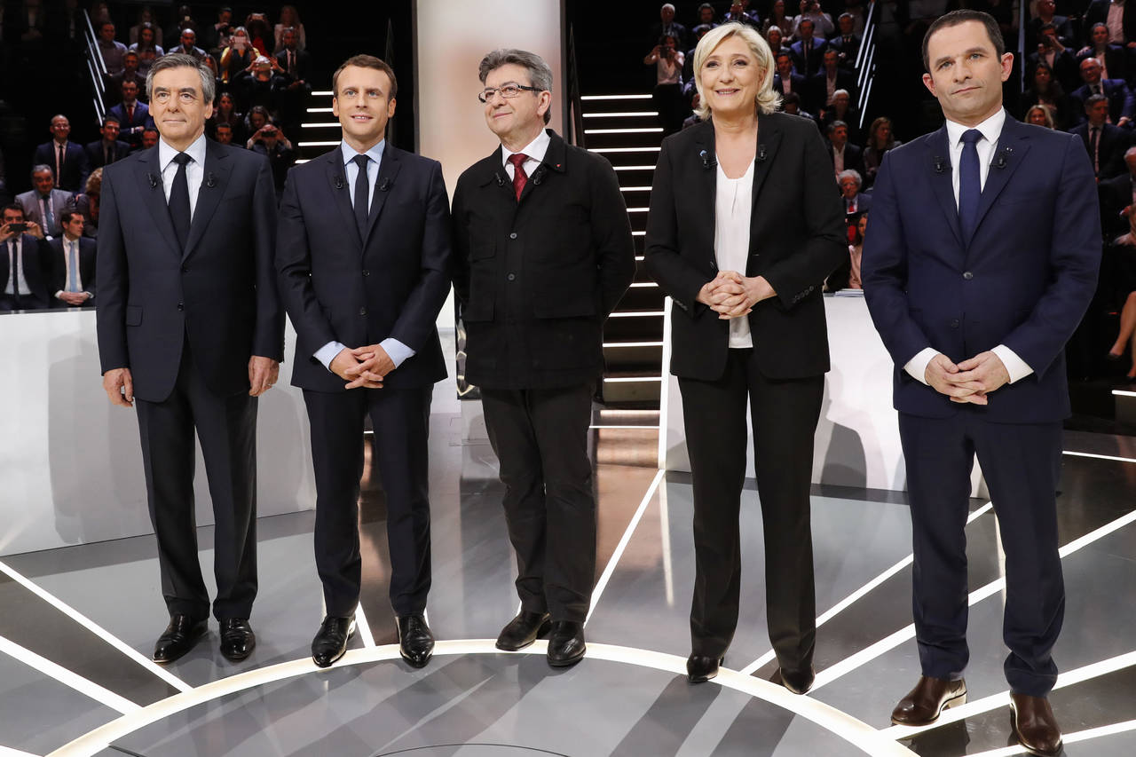 Macron y Le Pen, blanco de los ataques en debate