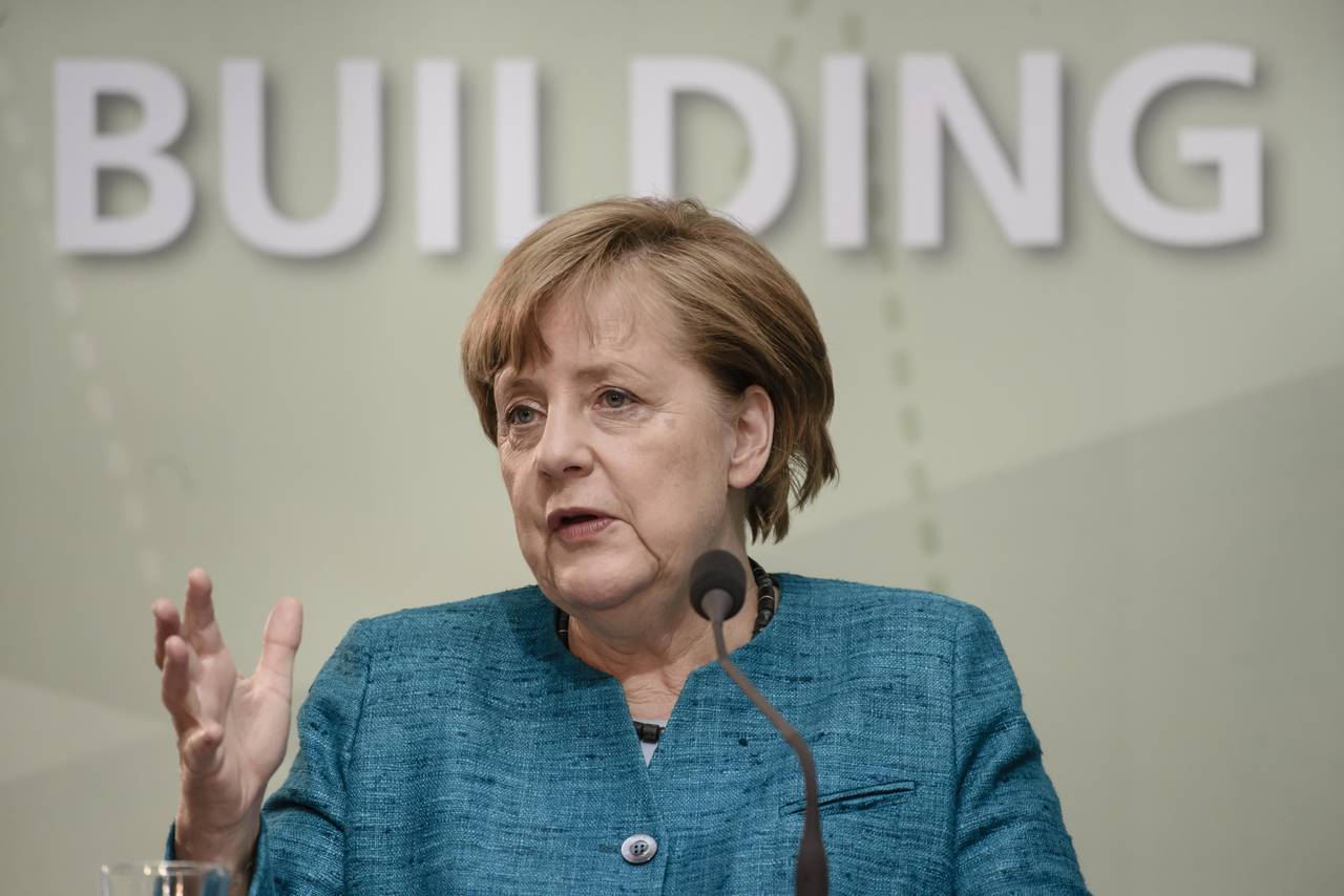Directa. La canciller alemana, Ángela Merkel, se reunió con varios  sindicatos de los países del G20.