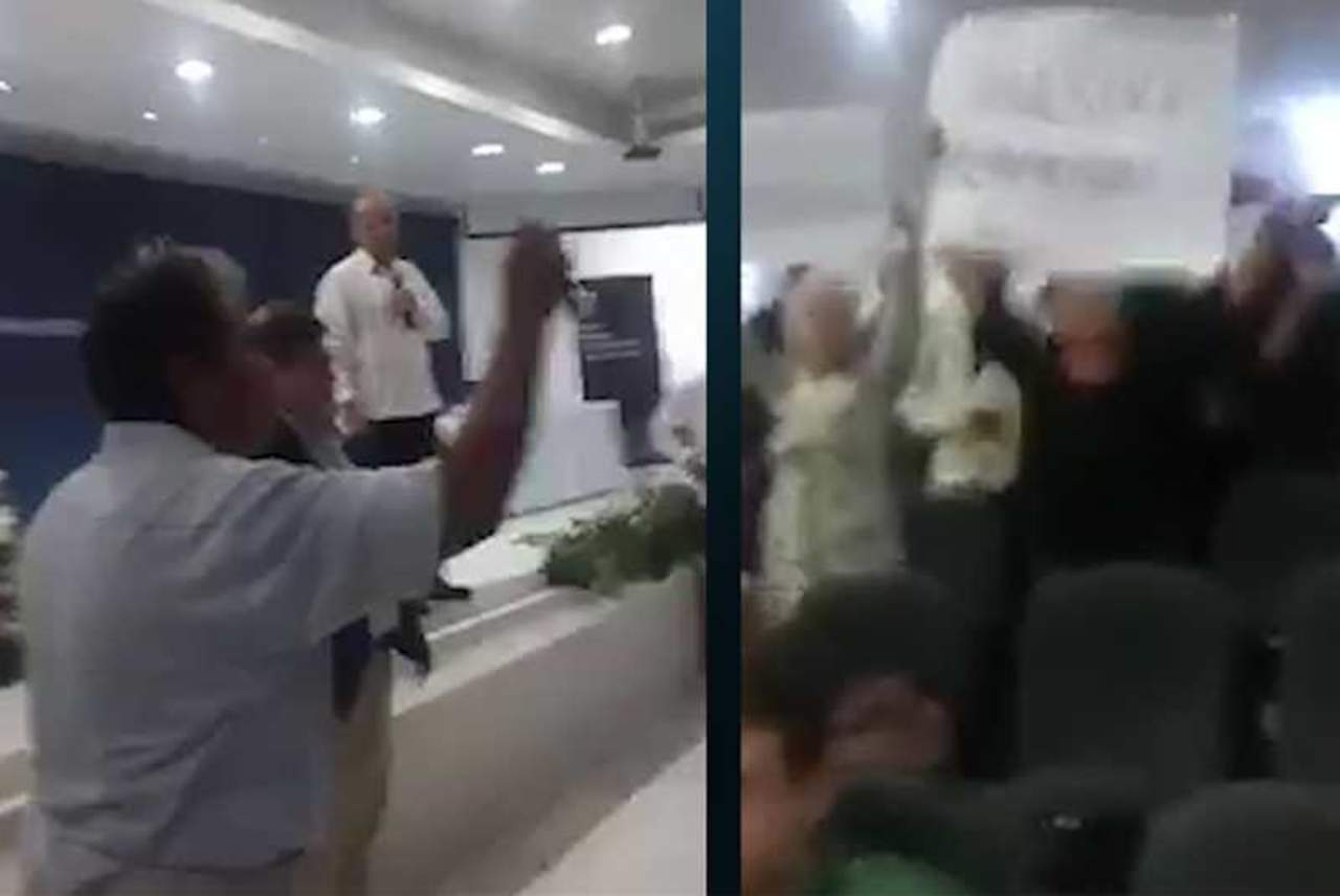Activistas gritan 'asesino' a Calderón en Cancún