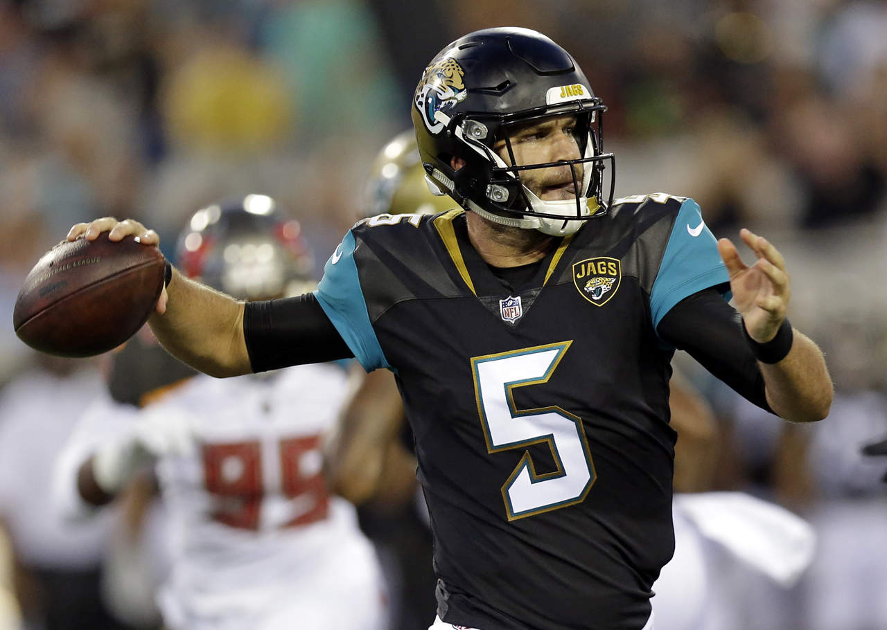 Blake Bortles (foto) le ganó la carrera por la titularidad a Chad Henne. (AP)