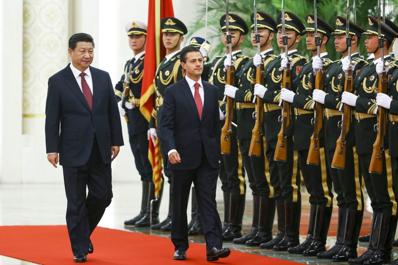 La cancillería refirió en un comunicado que la visita se da en el marco de la IX Cumbre BRICS, foro al que pertenecen Brasil, Rusia, India, China y Sudáfrica, y por invitación del presidente de la República Popular China, Xi Jinping. (ARCHIVO)
