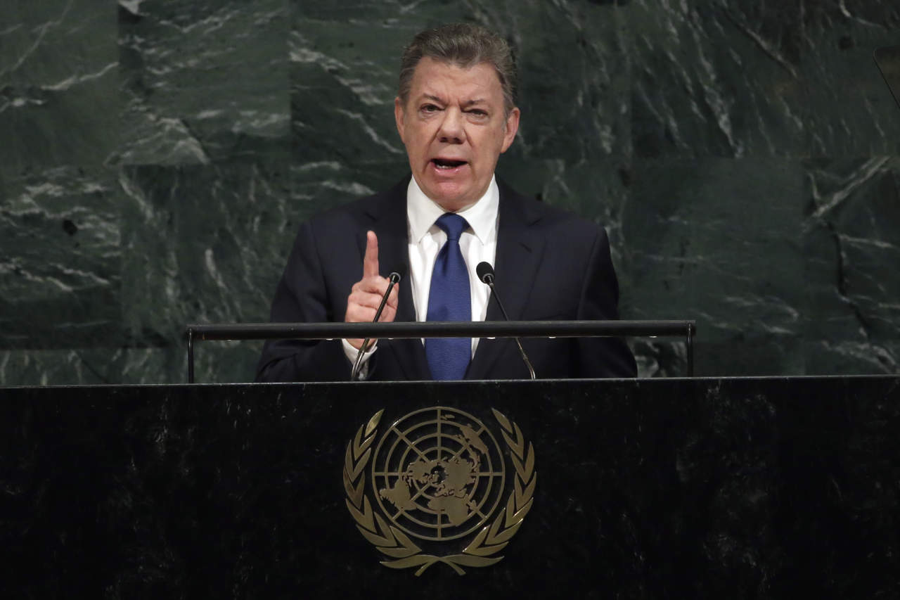 El mandatario dedicó buena parte de su discurso a desglosar los avances del proceso de paz con la guerrilla de las FARC. (AP)