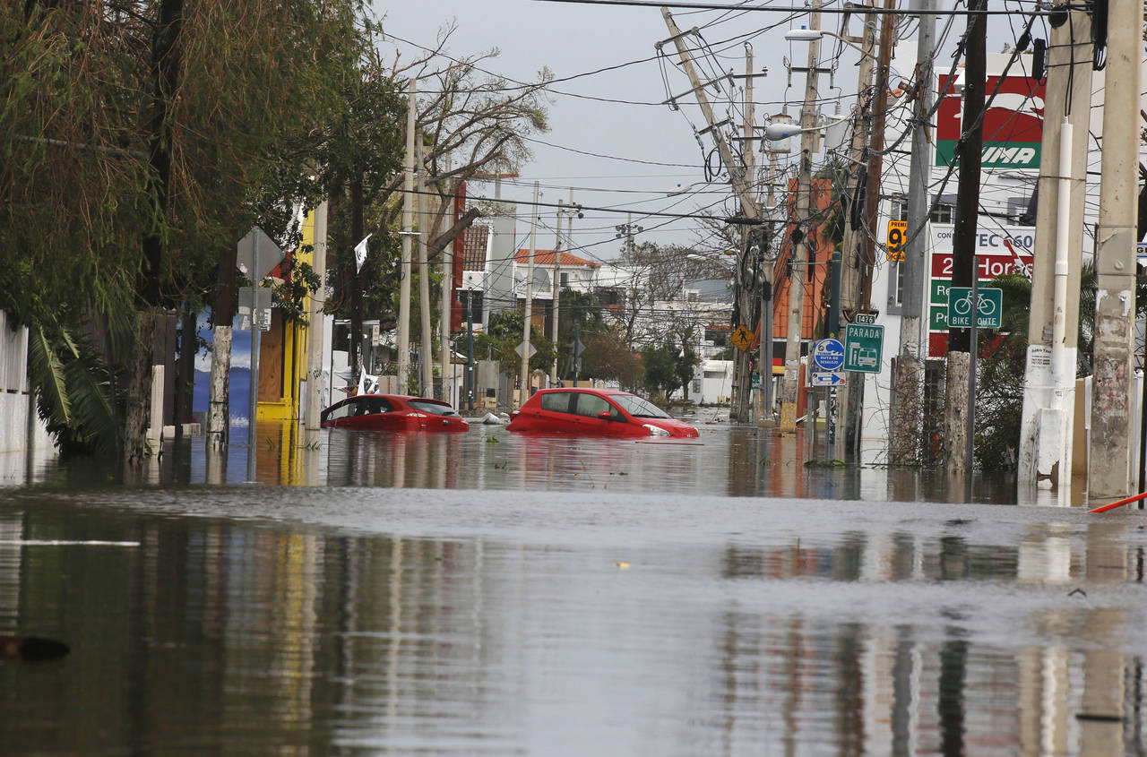 Inundación. Autoridades de Puerto Rico señalaron que los riesgos de mayores inundaciones continúan en algunas comunidades. 