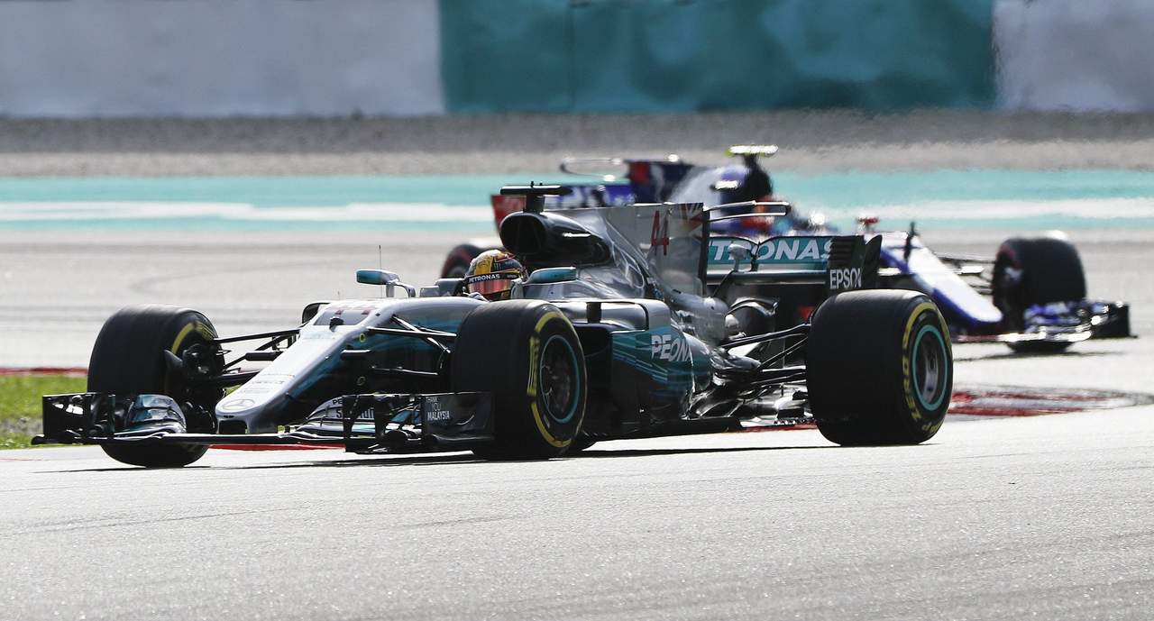 Lewis Hamilton consiguió la 'pole' número 70 en su carrera. (EFE)