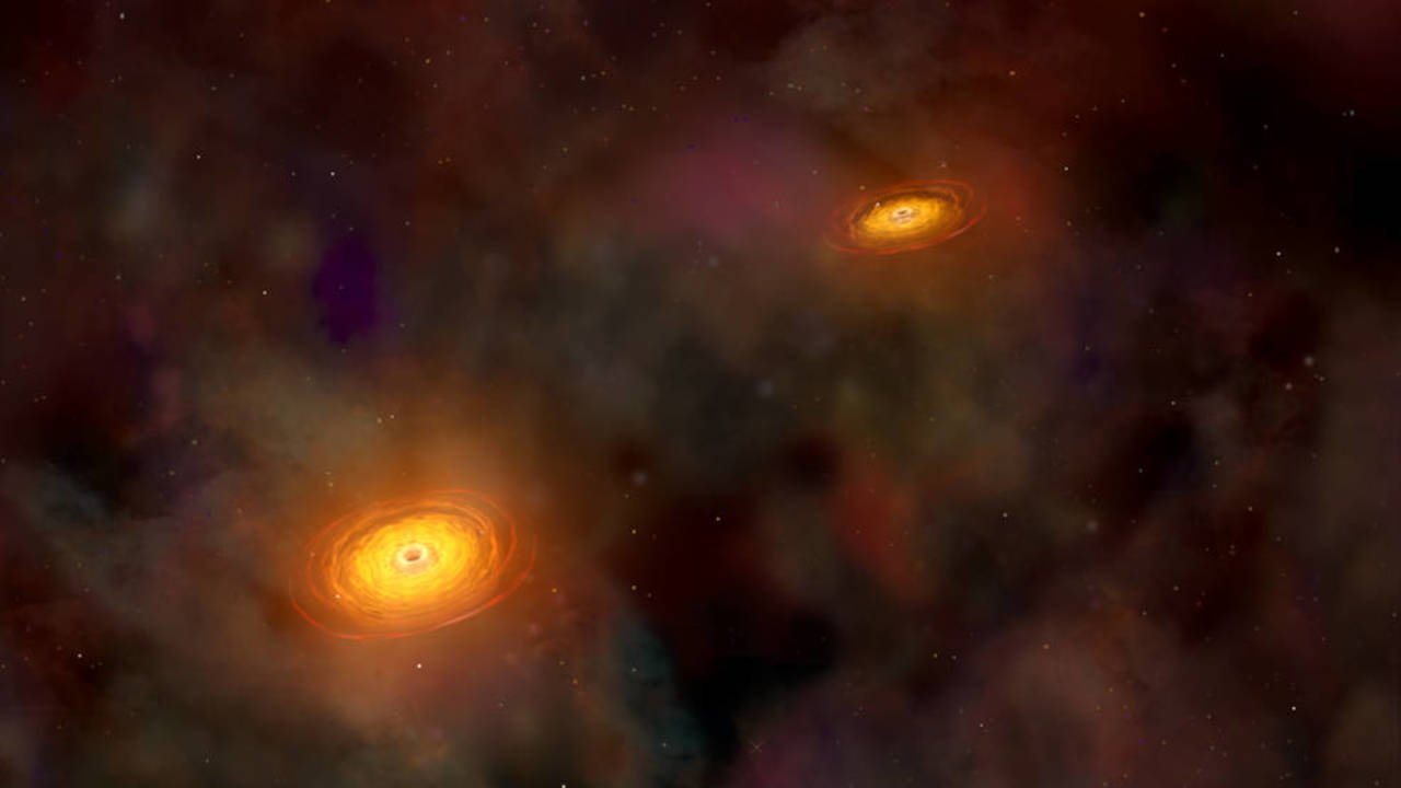 Supermasivos. Ilustración de una pareja de agujeros negros supermasivos, cada uno con millones de veces la masa solar. (NASA)