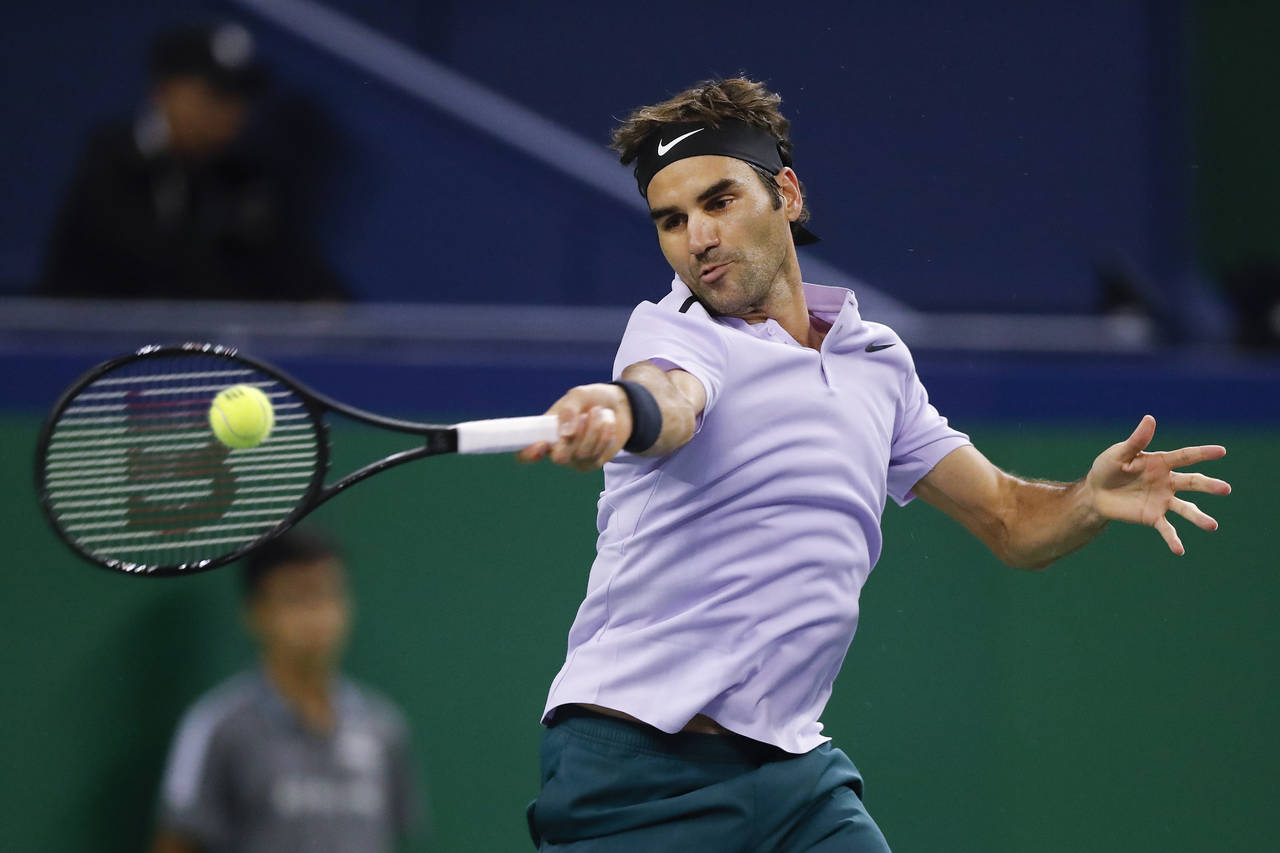 Roger Federer no tuvo muchos problemas para derrotar 6-4, 6-2 a Alexander Dolgopolov. (AP)