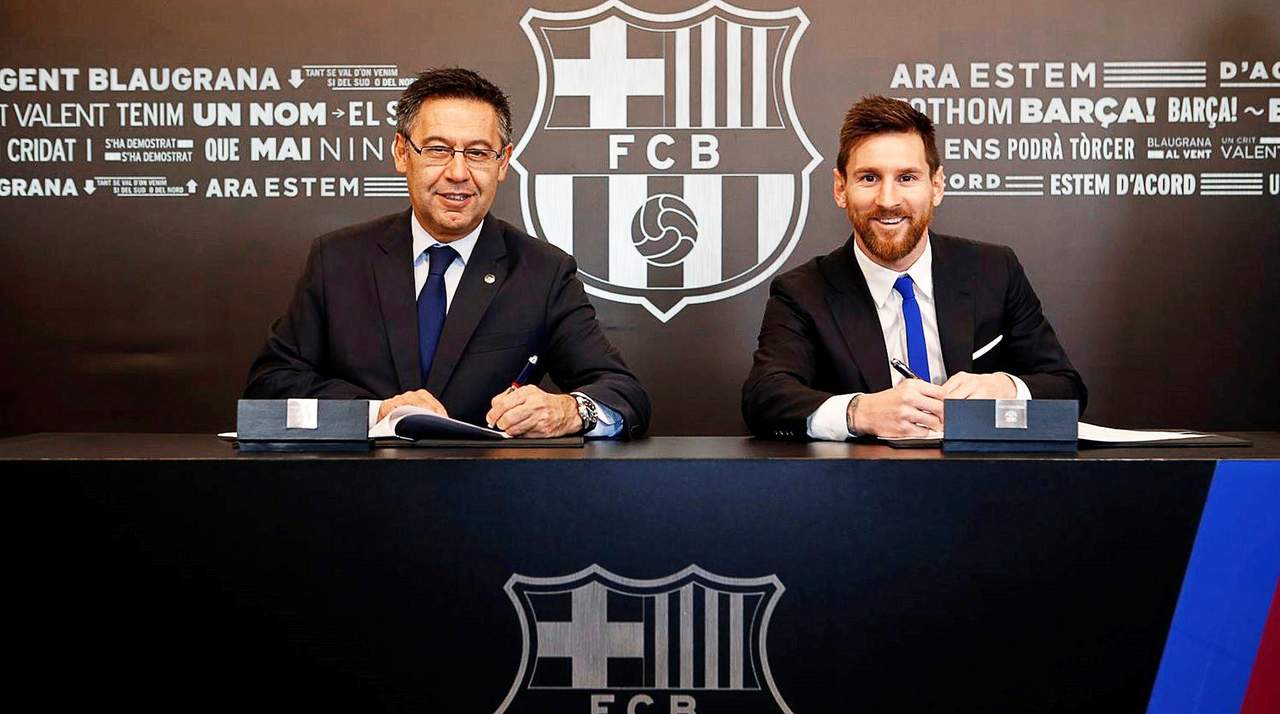 Messi firma su nuevo contrato hasta junio de 2021 y 700 millones de cláusula. (EFE) 