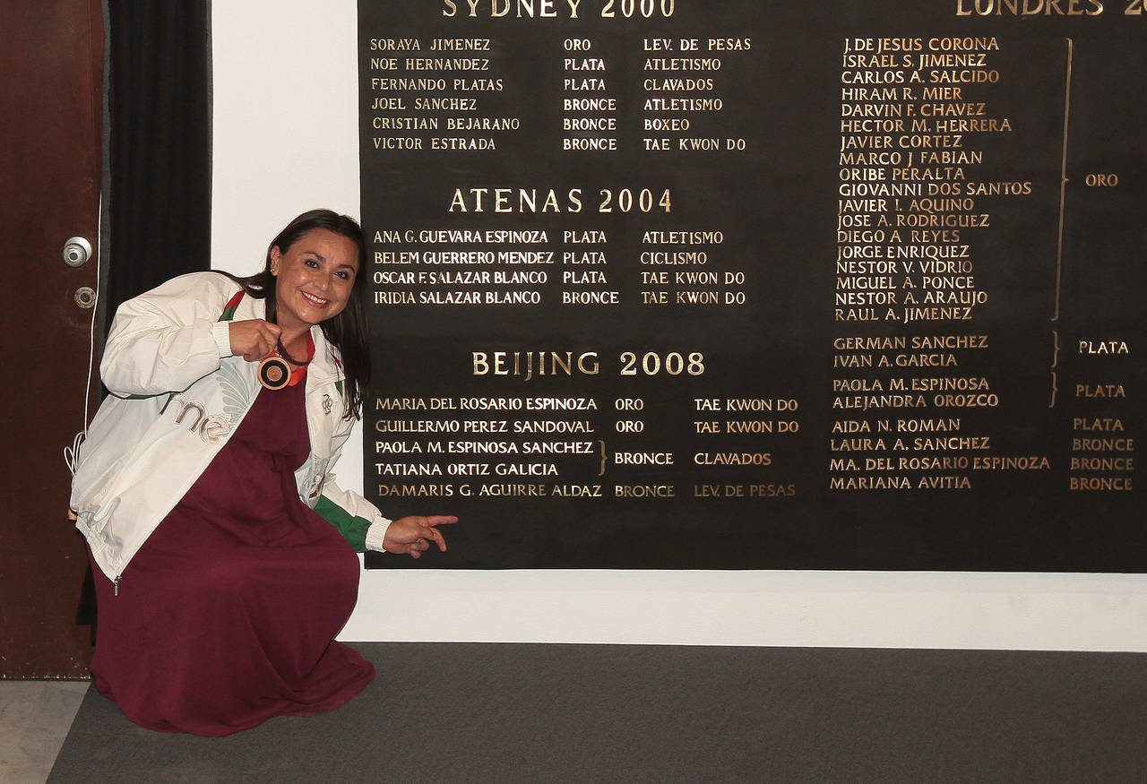 La exhalterista Damaris Aguirre se mostró contenta por recibir la medalla olímpica, por su asistencia en los Juegos Olímpicos de 2008. La presea le trae 10 mil mensuales