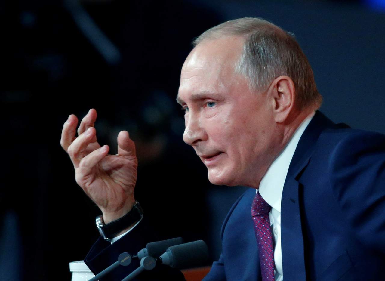 Acusación. Putin aseguró que la ‘trama rusa’ es un invento de los adversarios de Donald Trump para socavar su legitimidad. (EFE)