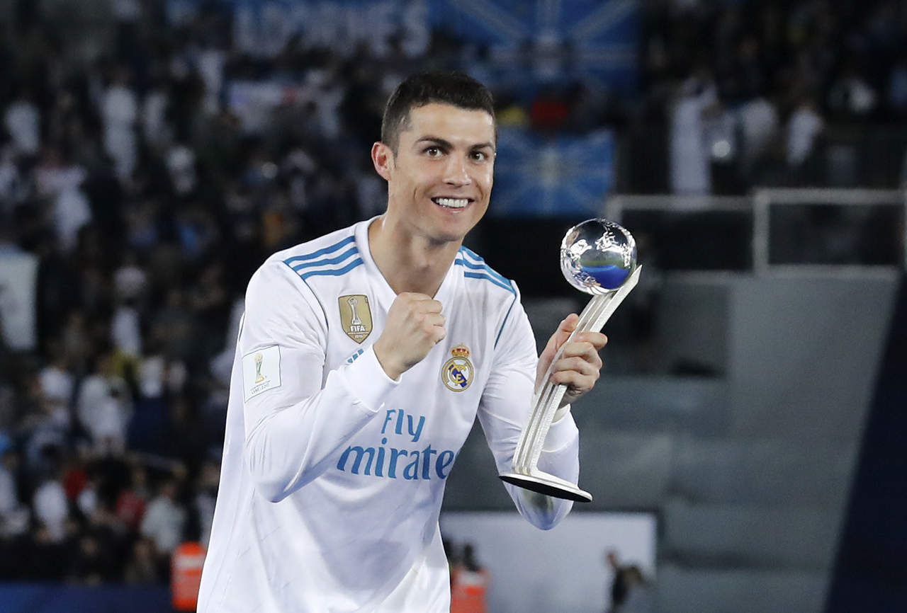 Cristiano mostró su felicidad por la conquista del Mundial de Clubes y por ser de nuevo decisivo en una final, con un gol que le permite igualar a Pelé, con 7 tantos. (ARCHIVO)