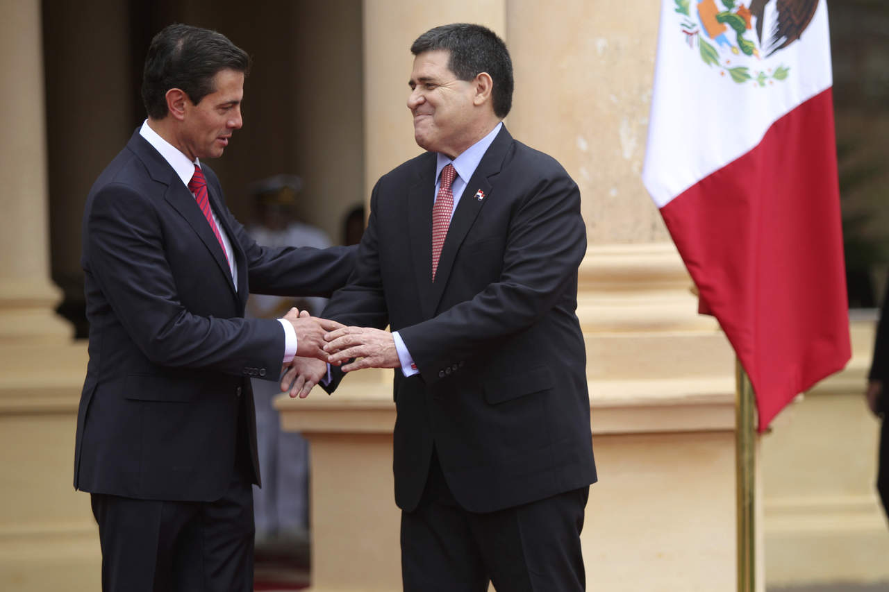 Visita. El presidente de Paraguay recibió ayer a su homólgo mexicano, Enrique Peña Nieto. (AP)