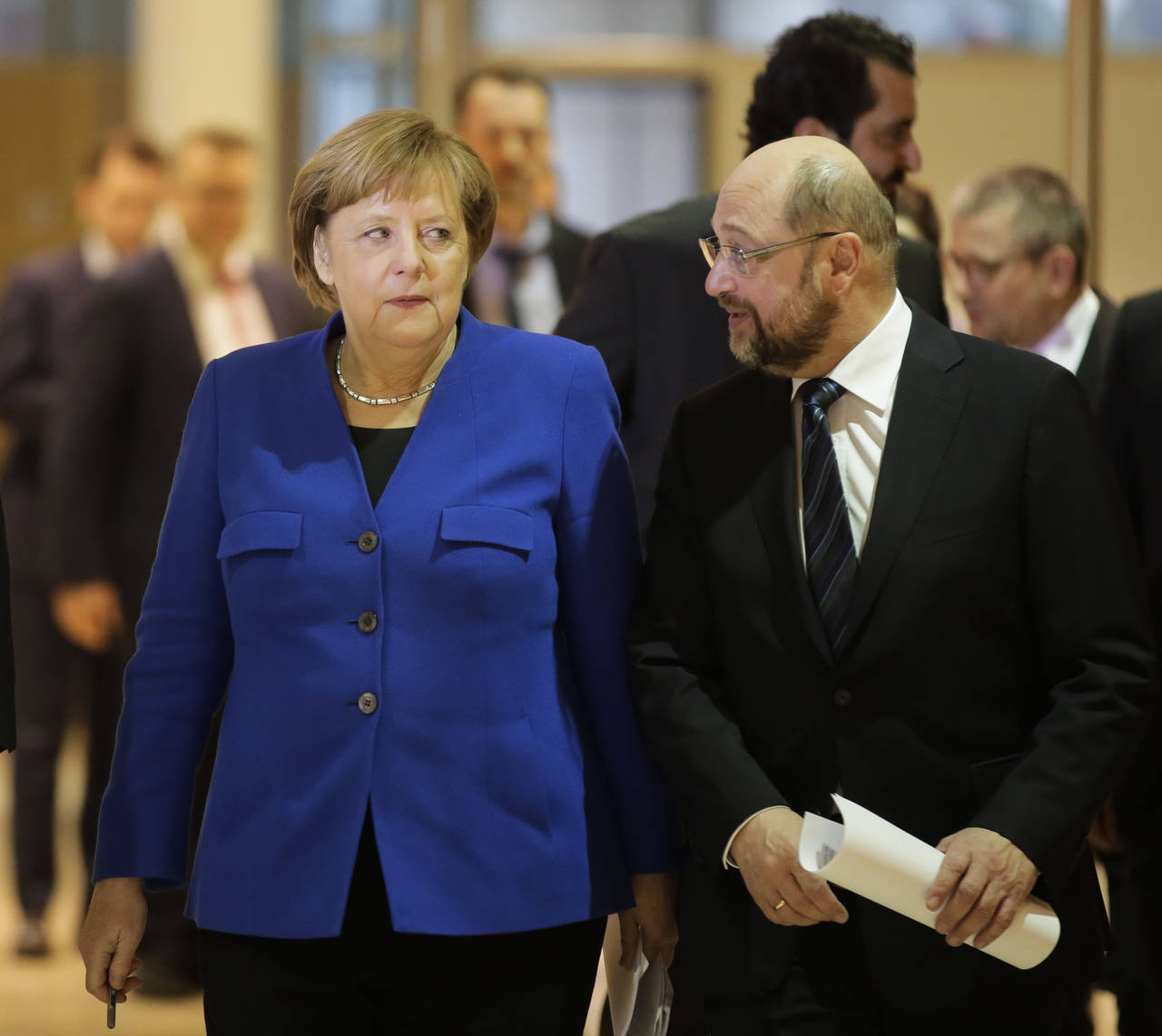 Partidos. Angela Merkel y Martin Schulz lideran las negociaciones formales para la coalición. (AP)