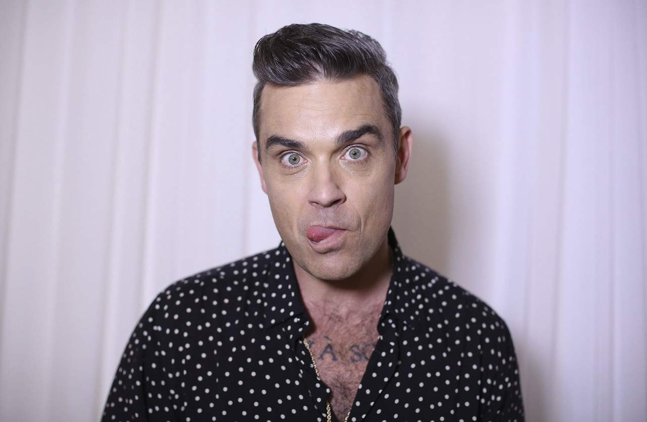 El cantante Robbie Williams realizó un anuncio que sorprendió a todos sus seguidores en el mundo, pues reveló que ya no cantará. (EFE)