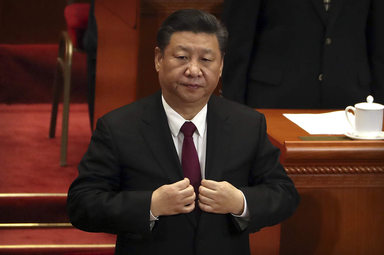 Xi, quien gracias a la reforma constitucional aprobada también por el ANP el pasado 11 de marzo podrá continuar en la presidencia de China después de 2023, fue elegido con 2.970 votos a favor, ninguno en contra y cero abstenciones. (ARCHIVO)