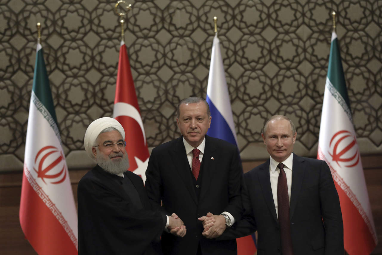 Rusia, Irán y Turquía firmaron hoy en Ankara una declaración conjunta con la promesa de impulsar un proceso de paz en Siria que desemboque en unas elecciones supervisadas por Naciones Unidas. (AP)