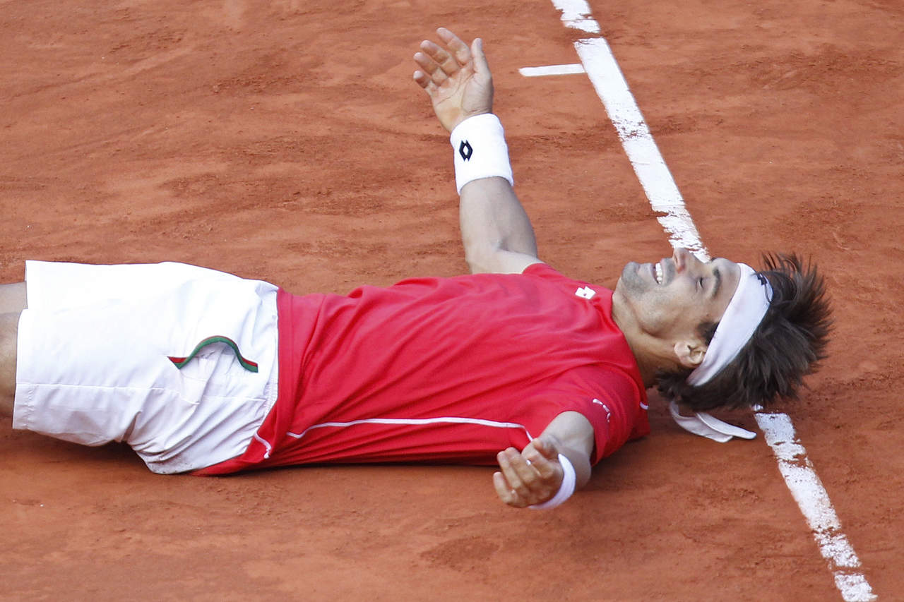 David Ferrer dio la victoria a España tras derrotar 7-6 (1), 3-6, 7-6 (4), 4-6, 7-5 al alemán Philipp Kohlschreiber. (AP)