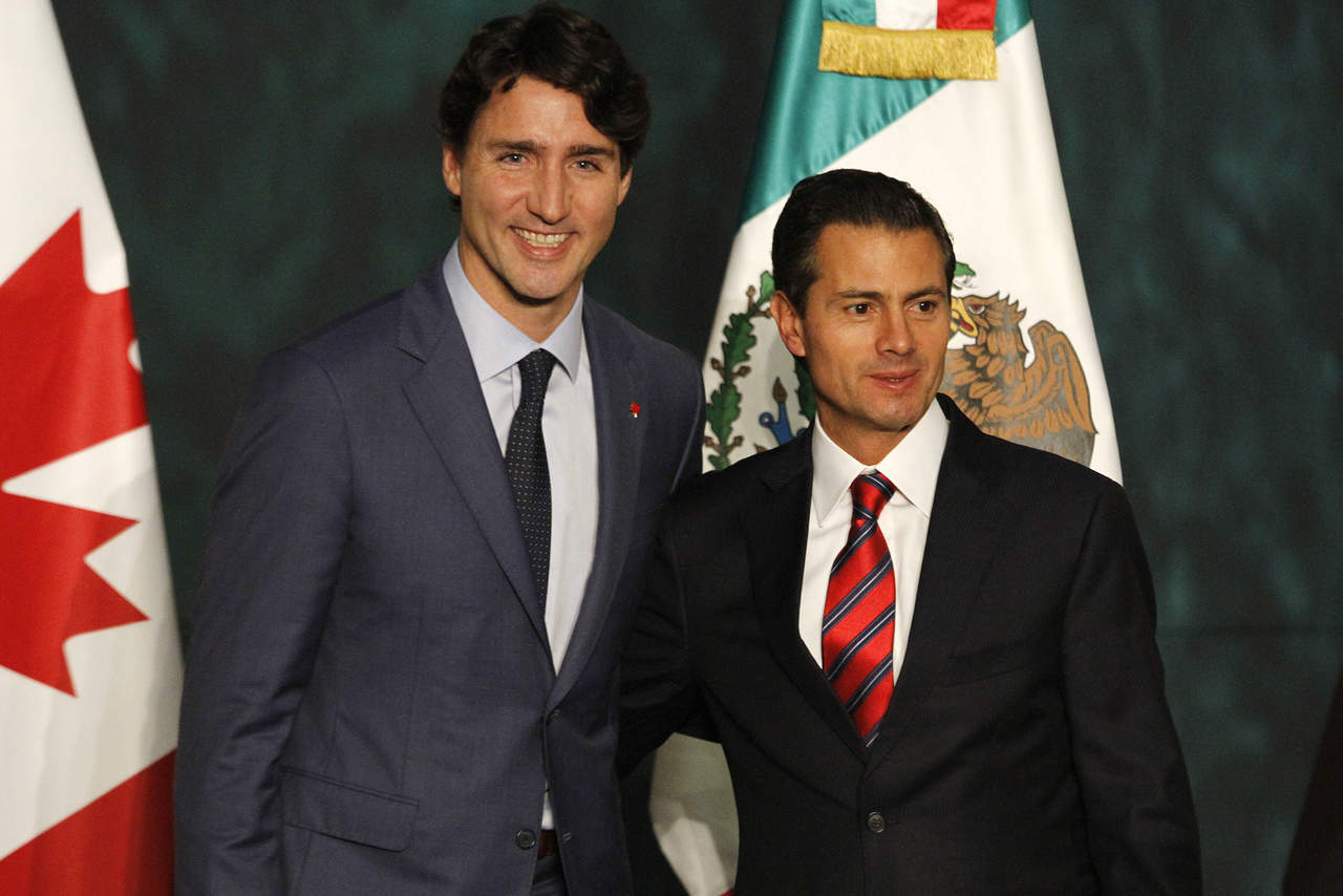 El primer ministro de Canadá, Justin Trudeau, se reunirá en privado con el presidente de México, Enrique Peña Nieto, mañana viernes en el marco de la VIII Cumbre de las Américas, a celebrarse en Lima, Perú, informó hoy la oficina del gobernante canadiense. (ARCHIVO)
