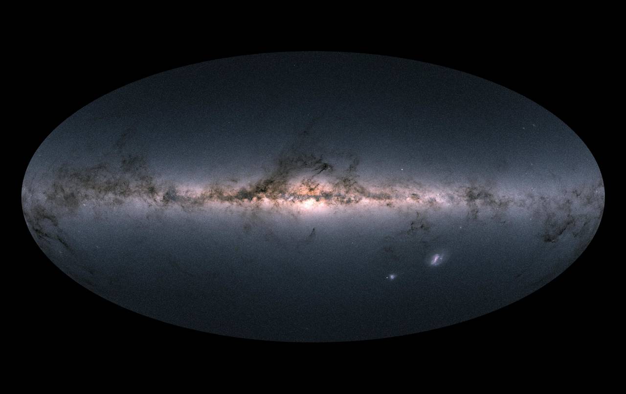 Magnificencia.  Esta fotografía muestra una imagen en color de la Vía Láctea y las galaxias vecinas basada en la observación y mediciones de casi 1.7 mil millones de estrellas. (EFE)