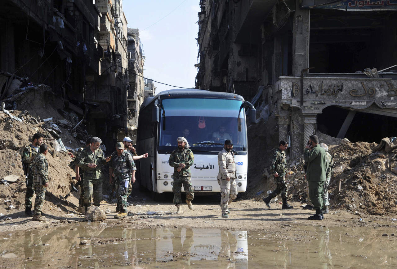 El Gobierno sirio recupera el control total de la capital y sus alrededores por primera vez después de 2012. (AP)