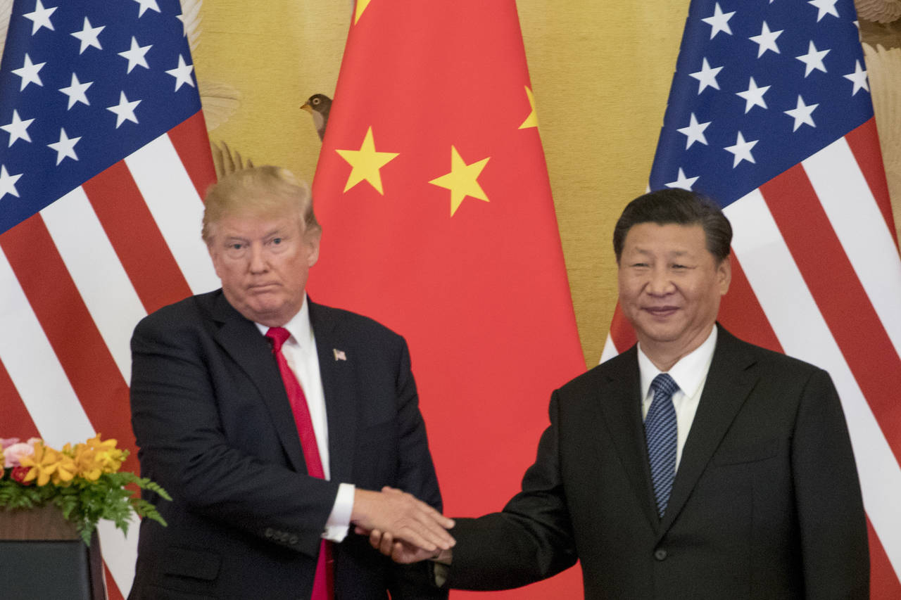 Guerra. La tensión comercial creció entre China y Estados Unidos después de que Trump aumentó los aranceles a la tecnología. (ARCHIVO) 