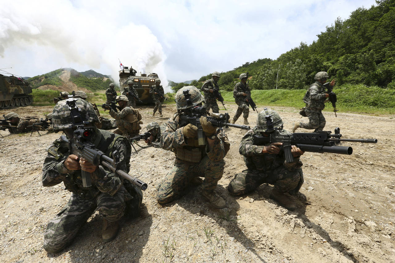 Decisión. EU se comprometió a suspender sus ejercicios militares con Corea del Sur. (AP)
