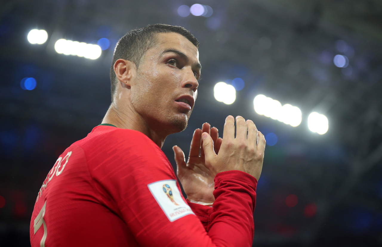 Cristiano Ronaldo, además, marcó por cuarto Mundial seguido, logró sus primeros goles en sus enfrentamientos con España y se situó al frente de la tabla de máximos goleadores del torneo. (EFE)