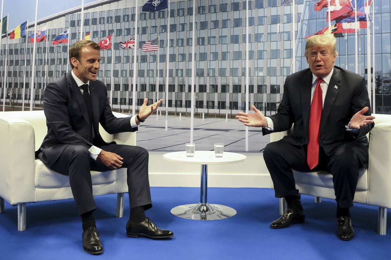 Amistad. Macron y Trump se vieron ayer en la primera jornada de la cumbre de la OTAN. (AP)