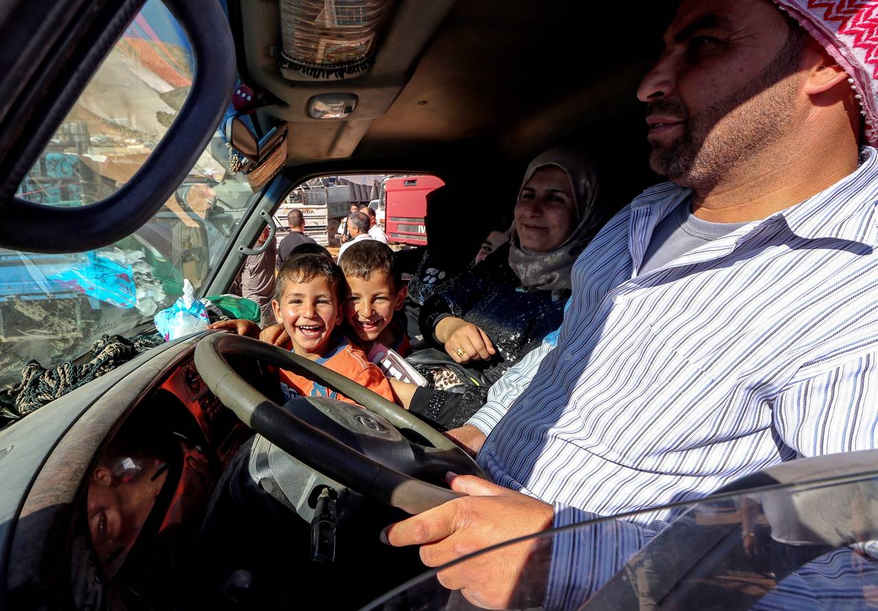 Esperanzas. Muchos de los refugiados expresaron su alegría por regresar a su casa. (EFE)