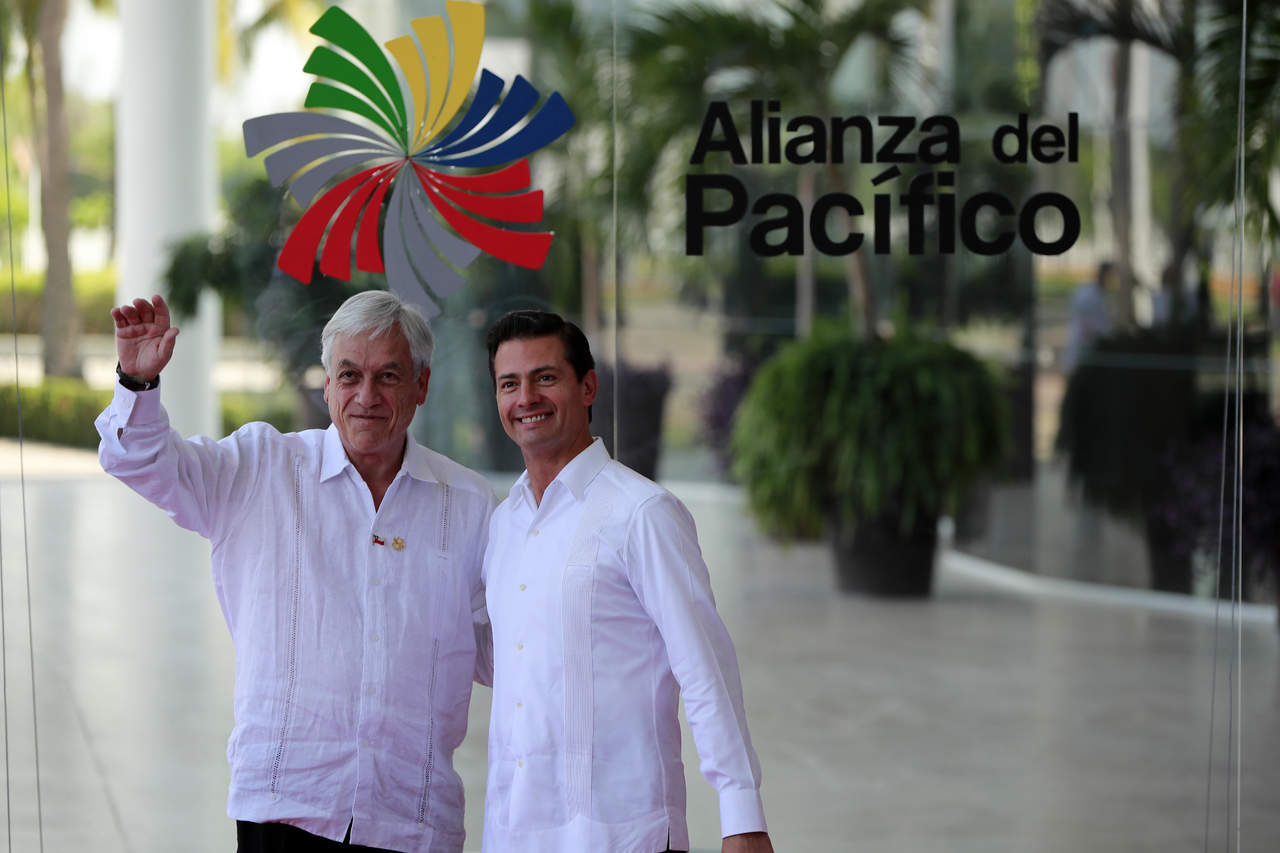 Esta mañana de martes, en el marco de la XIII Cumbre de la Alianza del Pacífico, el presidente Enrique Peña Nieto sostuvo una reunión bilateral con su homólogo de Chile, Sebastián Piñera. (EFE)