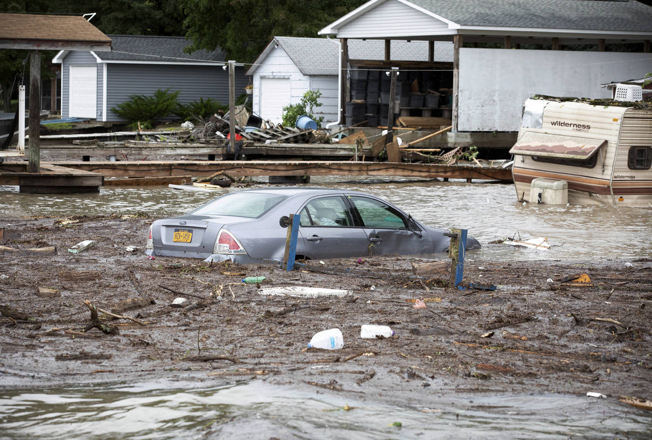 Riesgo. Las inundaciones de Nueva York sucedieron después de que fuertes lluvias provocaran inundaciones en Pensilvania. (AP)