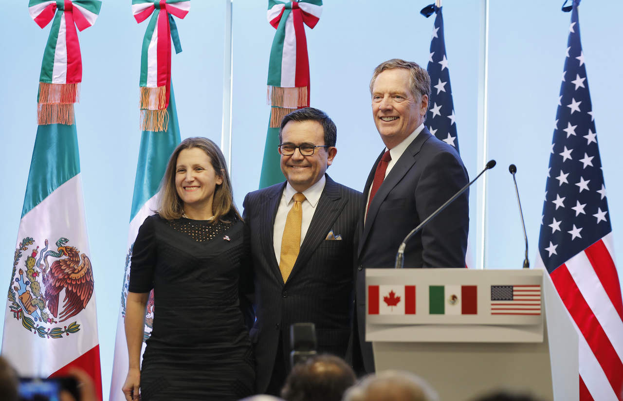 Estados Unidos y Canadá llegaron anoche a un acuerdo para que Canadá sea parte de un tratado de libre comercio junto con México y Estados Unidos. (ARCHIVO)