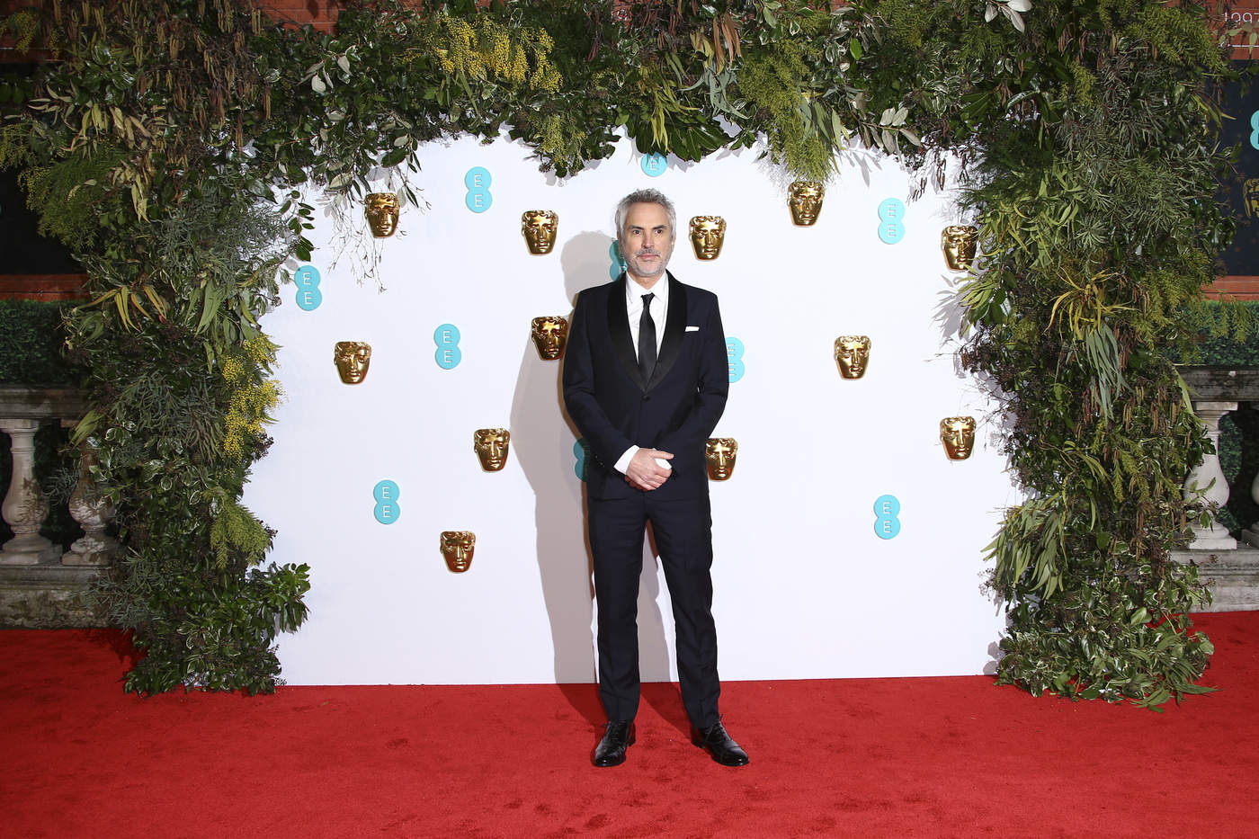 Alfonso Cuarón a su arribo a los BAFTA. (AP) 