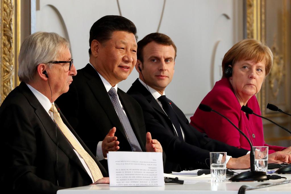 El presidente chino, Xi Jinping, se reunió ayer en París con Jean-Claude Juncker, Emmanuel Macron y Angela Merkel. (EFE)