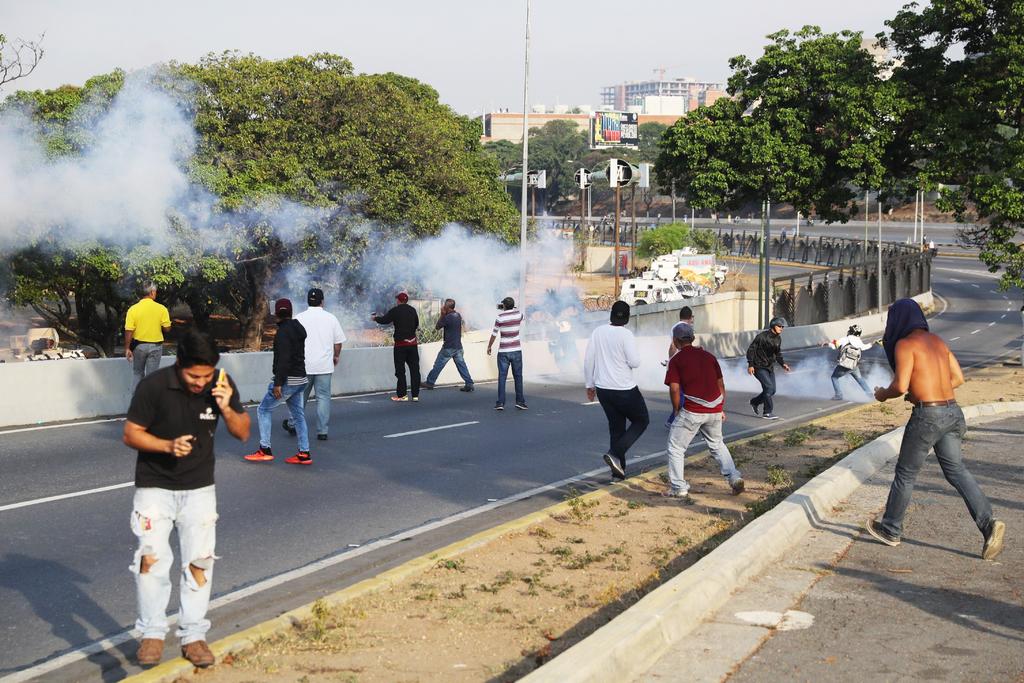 Los enfrentamientos se producen en las manifestaciones opositoras en Caracas. (EFE) 
