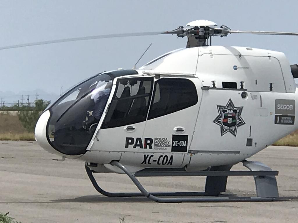 Abastecen helicóptero de seguridad pública para ir al lugar del accidente