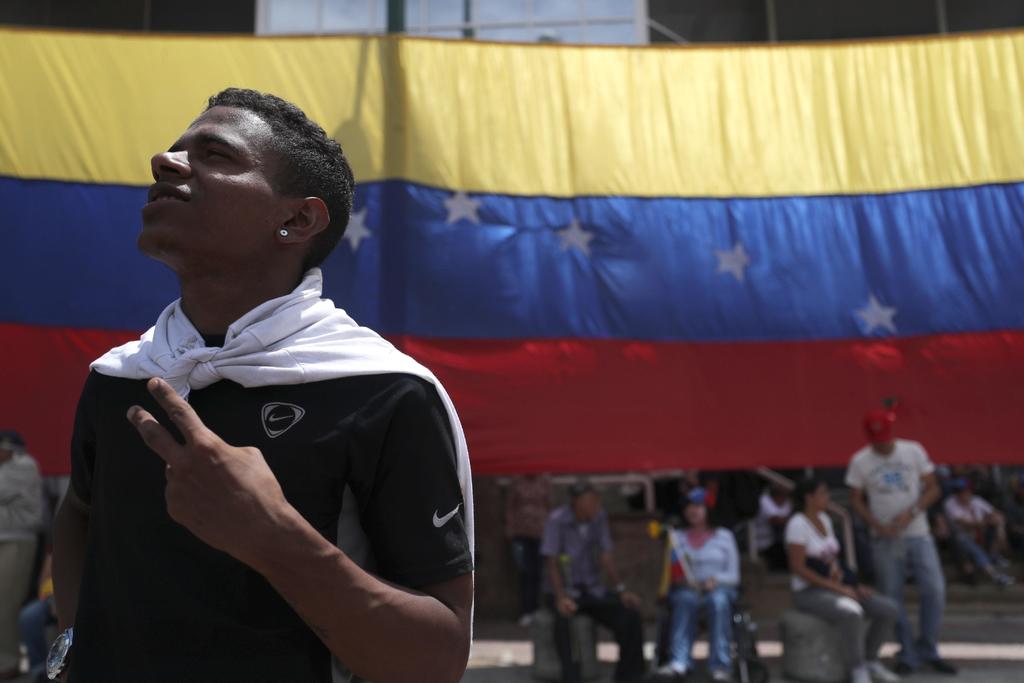 De norte a sur, por todas las naciones del continente, se encuentran venezolanos, chavistas y opositores, que llevan a su país a todas partes. (ARCHIVO)