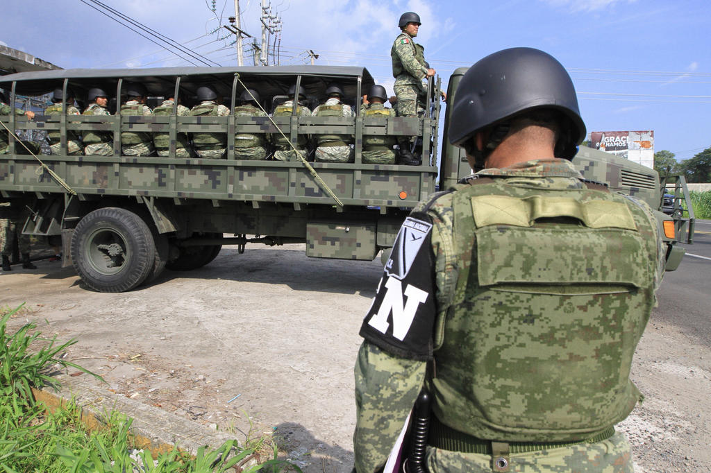 Durante la conferencia de prensa mañanera en Quintana Roo, el titular de la Sedena detalló el despliegue de frontera a frontera de la Guardia Nacional, además de que -dijo- tiene el apoyo del Ejército y la Marina, que tienen facultades para respaldar la estrategia en ese sentido. (ARCHIVO)