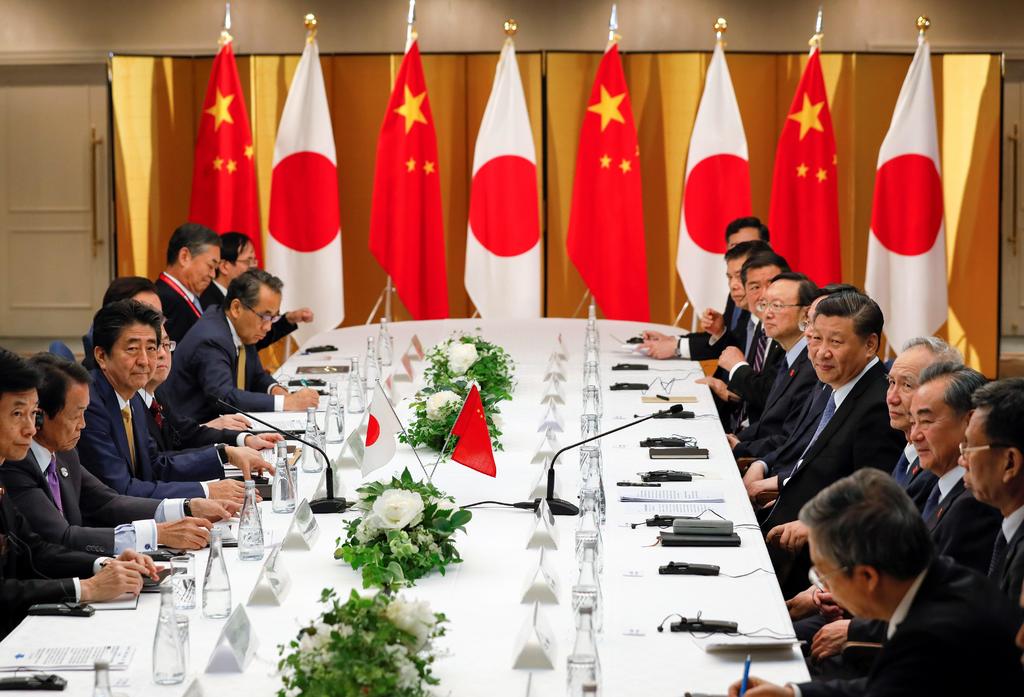 La delegación japonesa recibió al presidente chino Xi Jinping, uno de los protragonistas indisctutibles de la cumbre. (EFE)